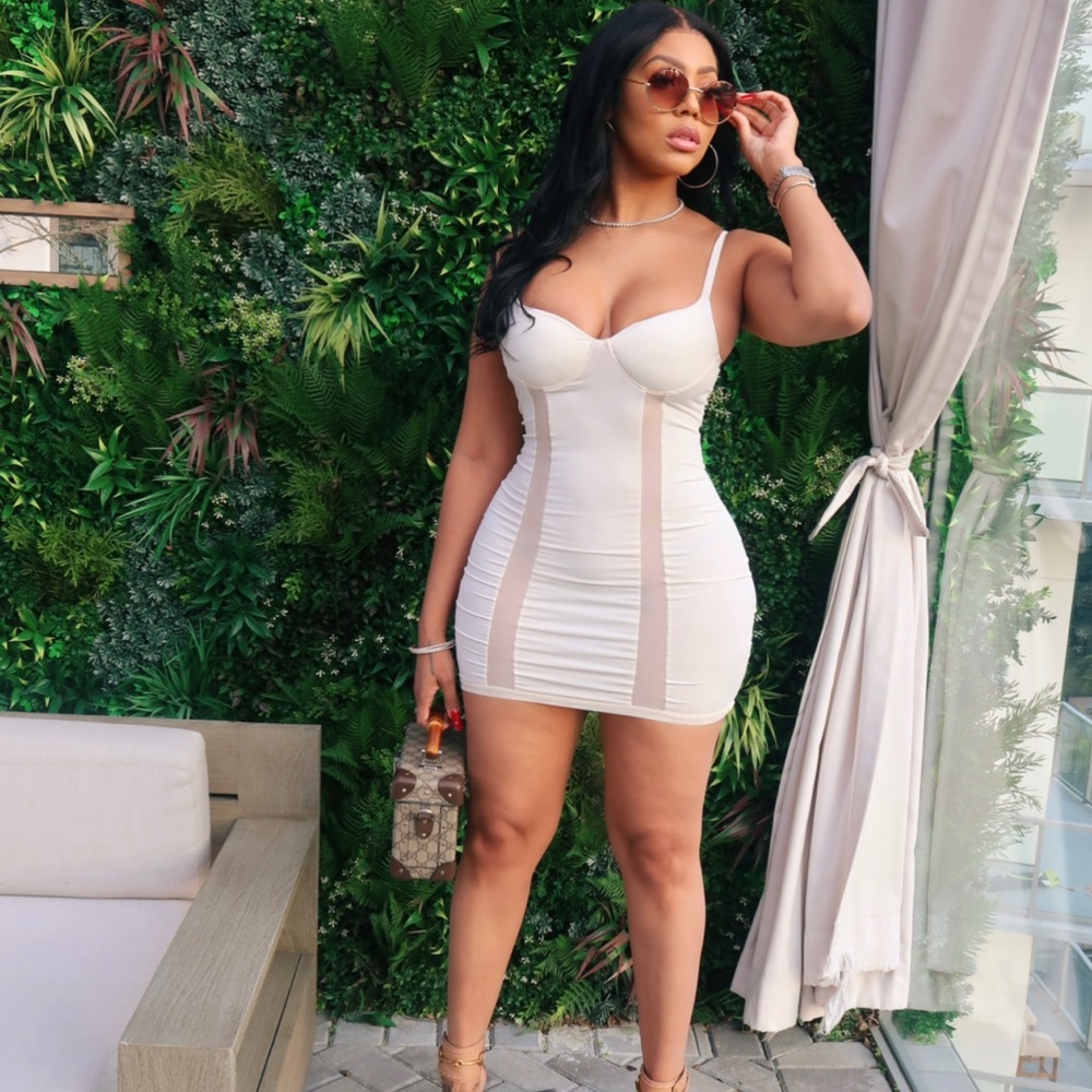 Stretchy mini dress with sheer panels